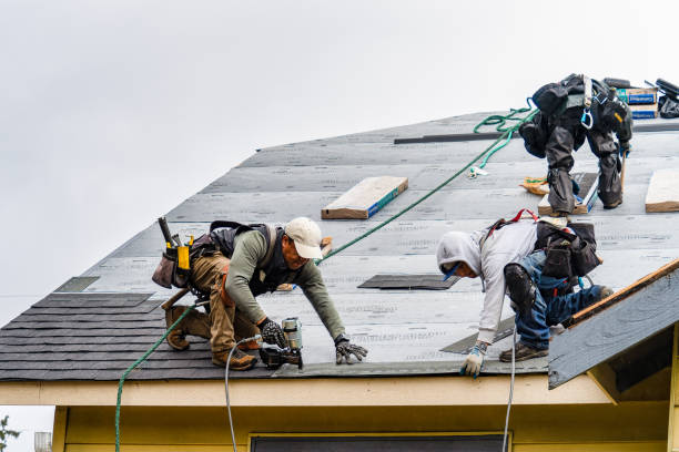 Professional Roofing technician working in New Castle, IN